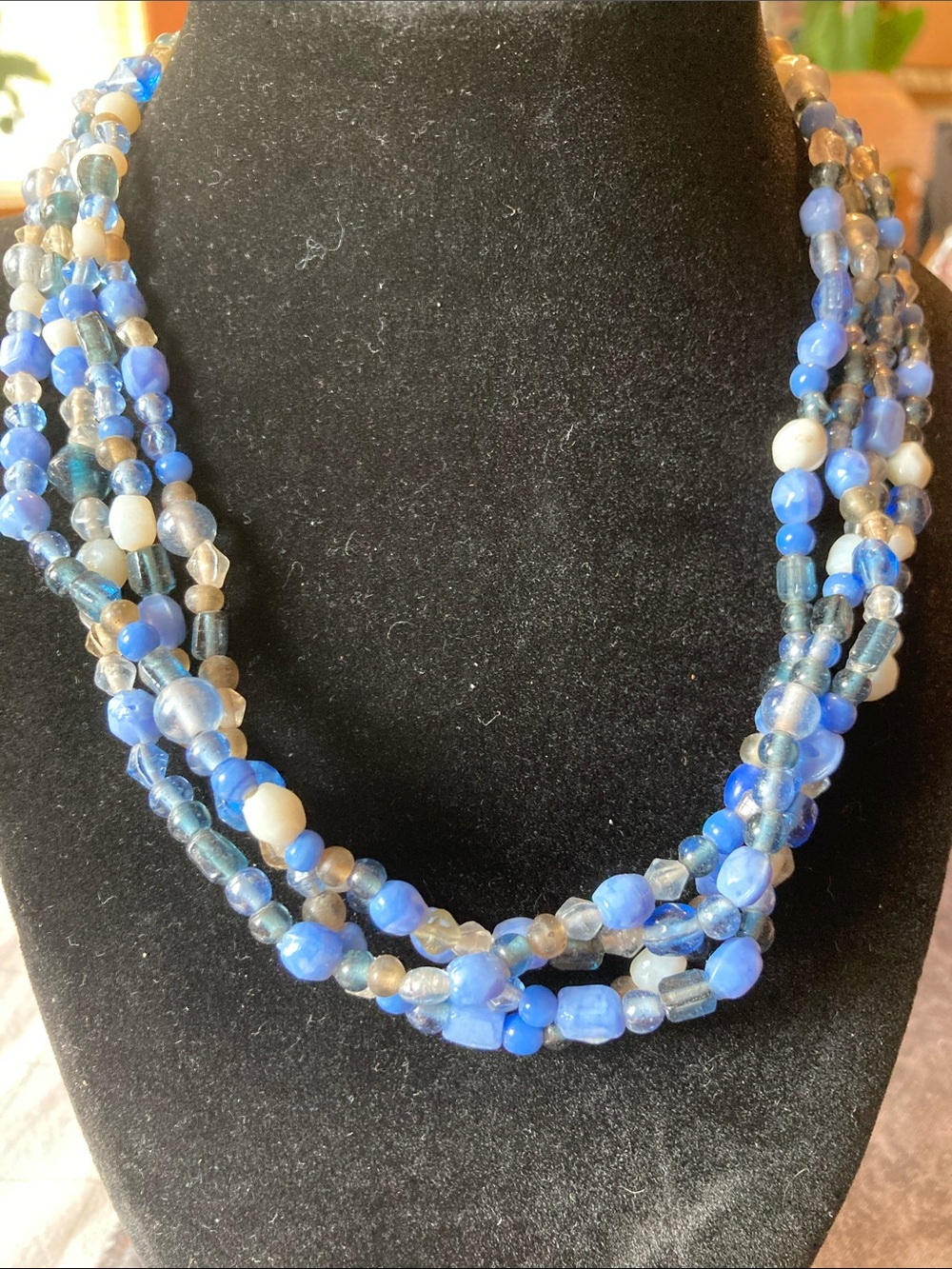 Multi-Strand Translucent Blue Beaded Necklace